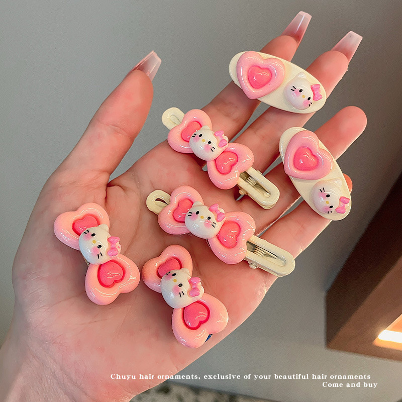 Kẹp tóc hồng cho bé gái, kẹp tóc hình trái tim bên hông, kẹp tóc trán, kẹp tóc Hello Kitty dễ thương