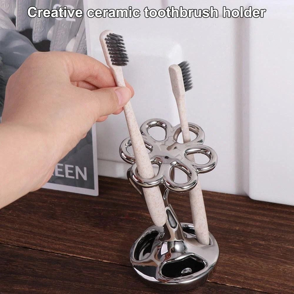 PWSSEND Giá đỡ bàn chải đánh răng, Giá đựng bàn chải đánh răng hình hoa bằng gốm, Sáng tạo chống ẩm 6 khe cắm Dễ dàng làm sạch Giá đựng đồ trong phòng tắm Đồ dùng phòng tắm
