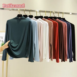Áo thun nữ Hồi giáo cổ cao Áo dài tay dáng rộng áo thun cotton mùa thu giản dị co giãn hàng đầu