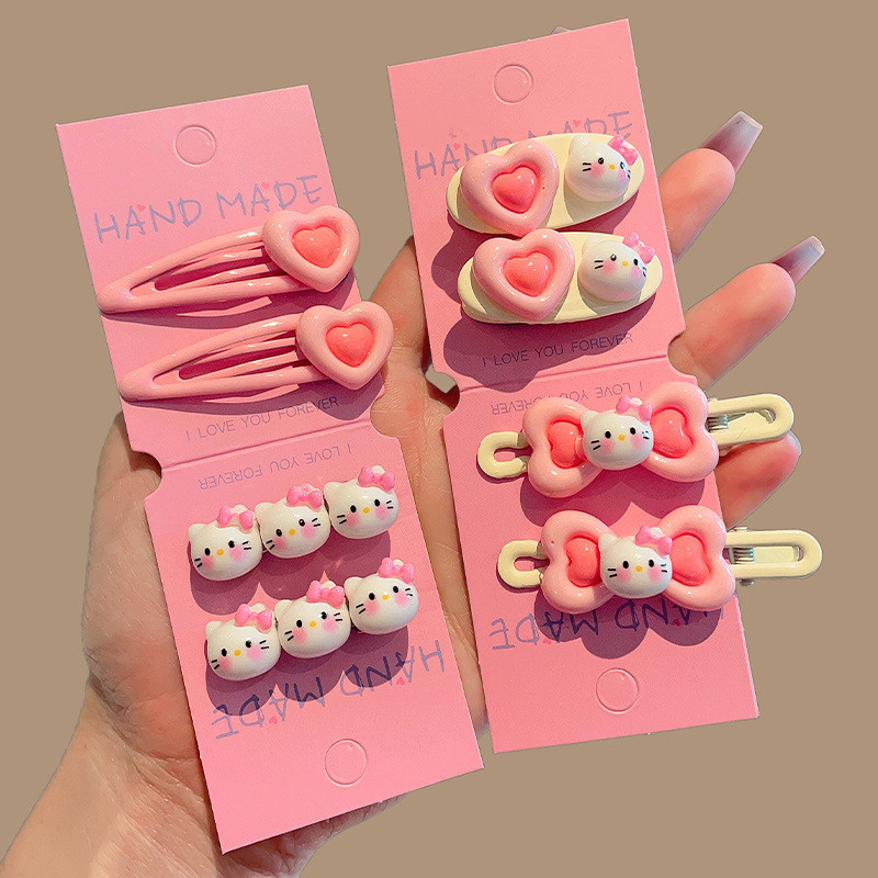 Kẹp tóc hồng cho bé gái, kẹp tóc hình trái tim bên hông, kẹp tóc trán, kẹp tóc Hello Kitty dễ thương