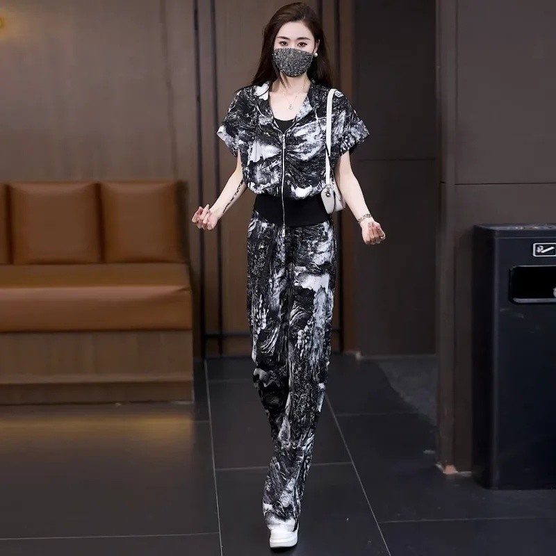 Bộ đồ thể thao châu Âu dành cho nữ Thời trang mùa hè Ice Silk Tay ngắn dáng rộng Quần ống rộng Bộ đồ hai mảnh