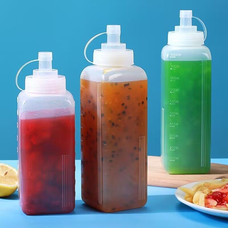 Bình nhựa đựng nước sốt chia vạch 800-1000ml, nắp chống bung, ép đùn cỡ nòng lớn