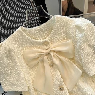 Áo blouse ngắn tay phồng thiết kế nơ nhẹ cho phụ nữ mùa hè 2025, thanh lịch và thoải mái cho buổi hẹn hò
