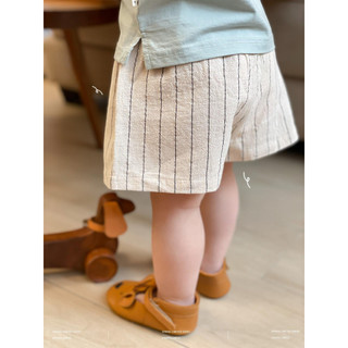 Quần short cotton lanh mỏng sọc caro cho bé trai và bé gái, dáng rộng rãi mùa hè