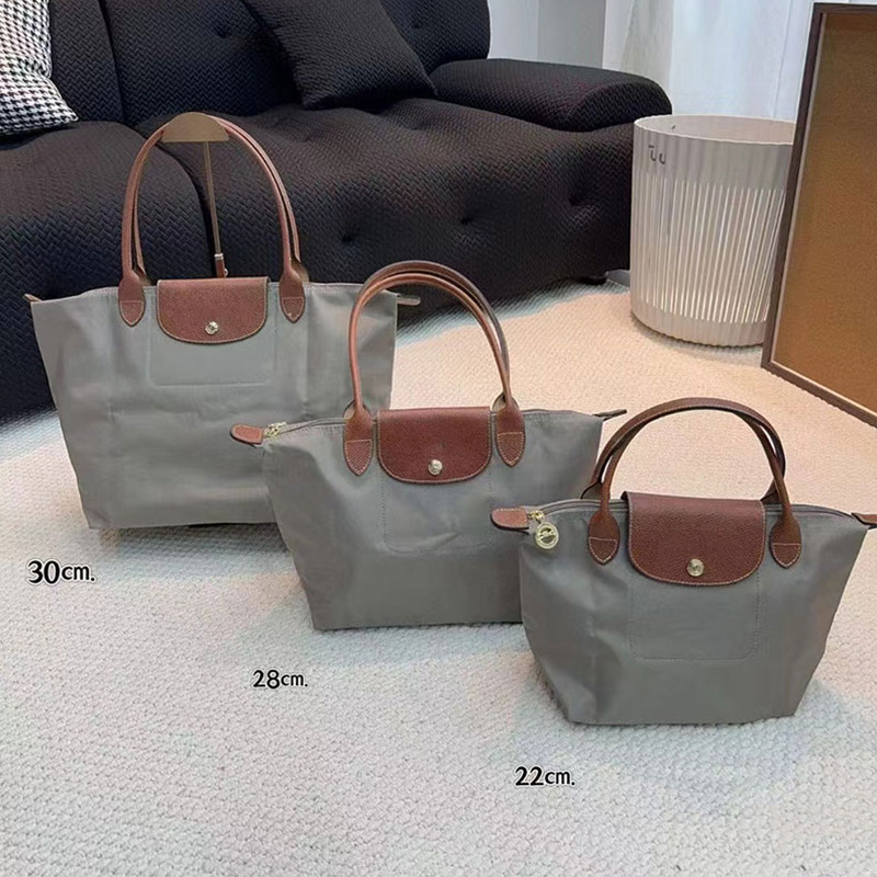 Pháp Chiến Tranh Ngựa Da Nữ Tay Cầm Dài Túi Đeo Vai Đơn Chống Thấm Nước nylon Du Lịch Bánh Bao Túi Vừa Và Lớn Túi Tote