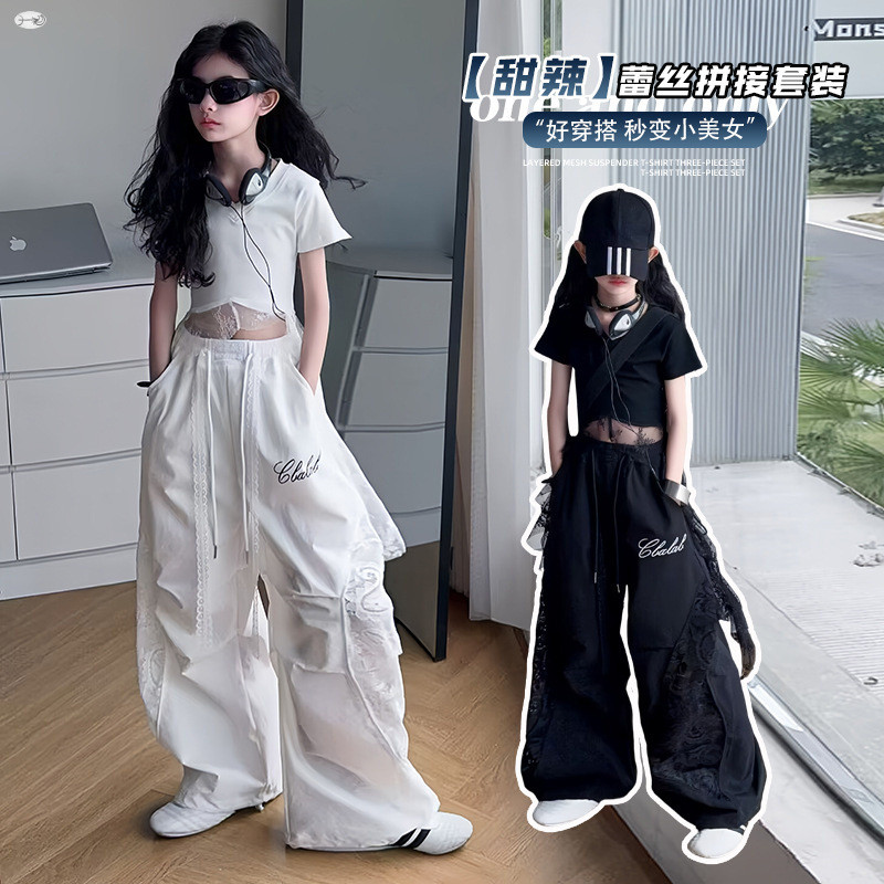 Bộ Đồ Thời Trang Bé Gái Mùa Hè 2025 Phong Cách Mới Trẻ Em Mỏng Phong Cách Ren Không Đều Khâu Áo Thun Tay Ngắn + Quần Ống Rộng Bộ Đồ Hai Mảnh
