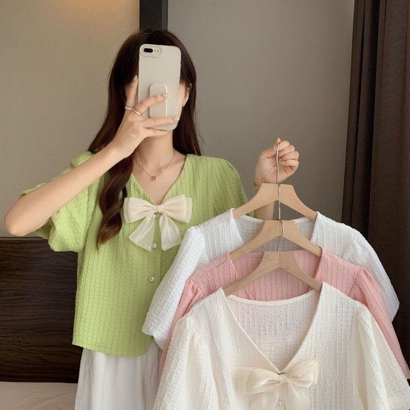 Áo sơ mi cổ chữ V dành cho nữ mùa hè 2025 phong cách mới thời trang Pháp giản dị nơ ngắn tay áo voan dành cho nữ