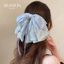Kẹp tóc nơ voan cao cấp mùa hè 2025 - Phụ kiện tóc đuôi ngựa sang trọng với dải ruy băng vàng (Thiết kế độc đáo)