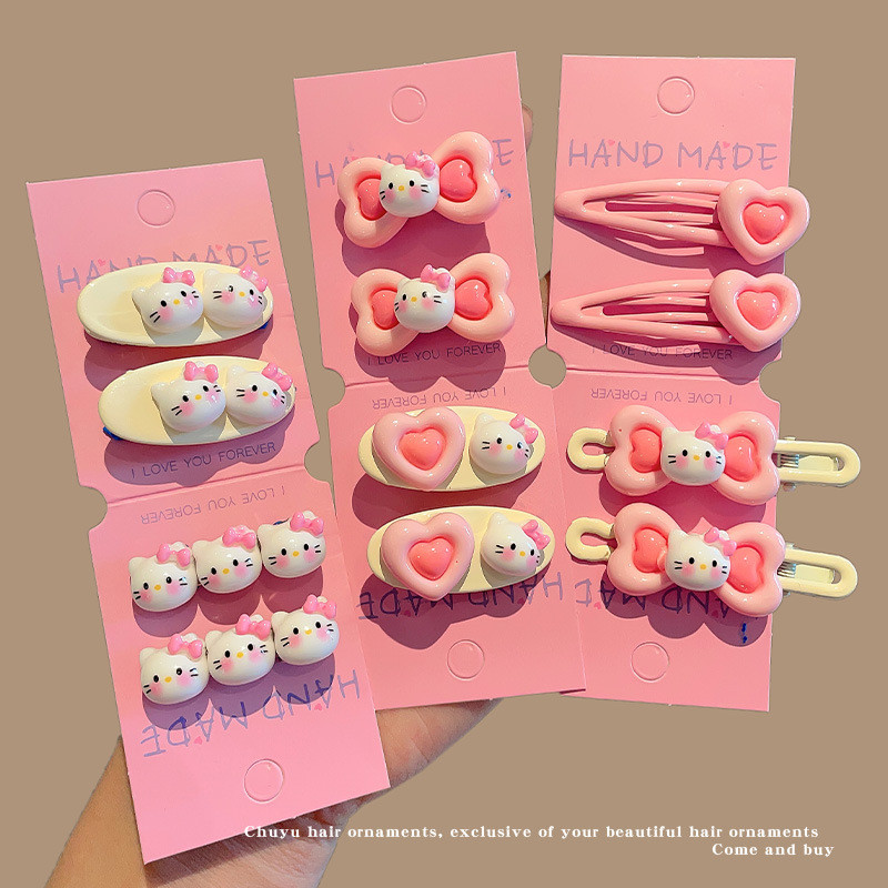 Kẹp tóc hồng cho bé gái, kẹp tóc hình trái tim bên hông, kẹp tóc trán, kẹp tóc Hello Kitty dễ thương