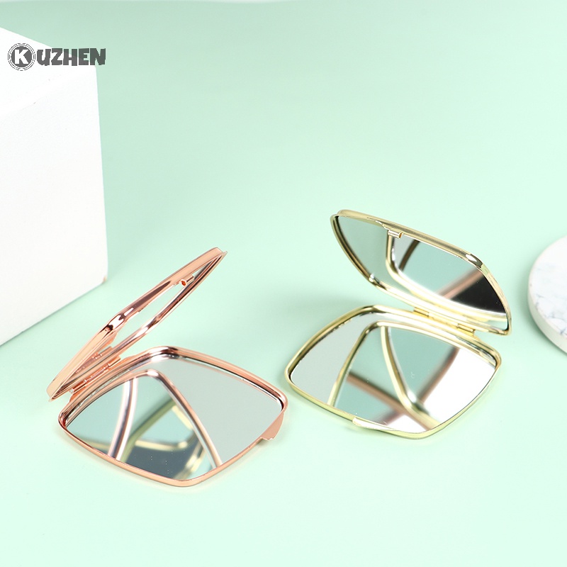 Gương trang điểm tròn nhỏ gọn Kuzhen
