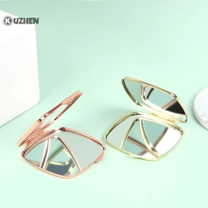 Gương trang điểm tròn nhỏ gọn Kuzhen