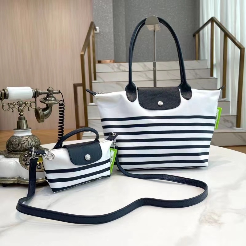 Chiến Ngựa Túi Nữ Màu Xanh Navy Sọc Bánh Bao Túi Vải Nylon Chống Thấm Nước Chất Liệu Da Bò Mini Di Động Túi Đeo Vai