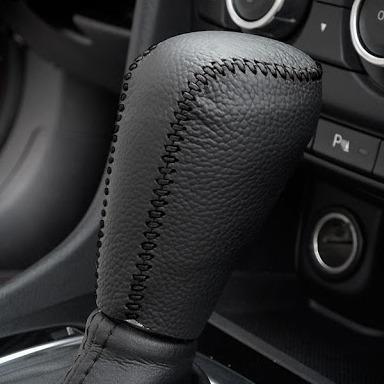 Bọc cần số da Bò xe Mazda 2,3,6, CX5, CX8, BT50 Số Tự Động (AT) có lẫy cò bấm phía trước da bò 100%