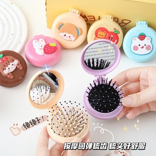 Gương mini kèm lược massage họa tiết hoạt hình dễ thương. Gương tròn mini gấp gọn kèm lược tiện lợi