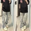 Quần jeans thẳng rách retro phiên bản Hàn Quốc mới cho nam nữ mùa xuân 2025