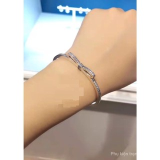 Vòng tay nơ đá sáng bóng stocksilver 925 PLRQ