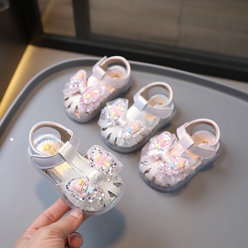 sandal bé gái dép rọ tạp đi bảo vệ chân cho bé từ 6m nơ cô gái xinh xắn chống trượt êm chân công chúa A1609