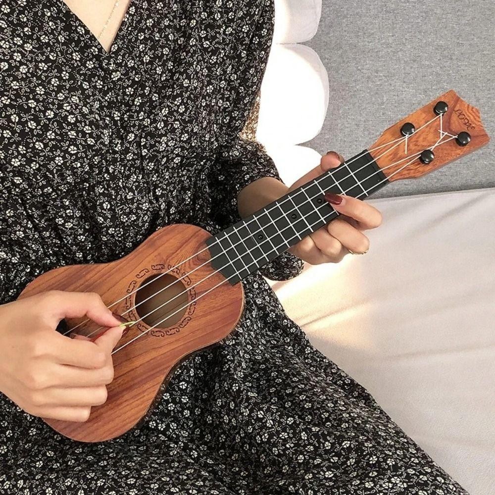 Đồ chơi nhạc cụ FUHUIOT Ukulele 4 dây, đàn guitar nhỏ cổ điển bền bỉ có thể chơi cho người mới bắt đầu