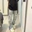 Quần jeans thẳng rách retro phiên bản Hàn Quốc mới cho nam nữ mùa xuân 2025