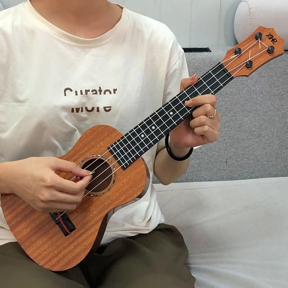 Đồ chơi nhạc cụ FUHUIOT Ukulele 4 dây, đàn guitar nhỏ cổ điển bền bỉ có thể chơi cho người mới bắt đầu