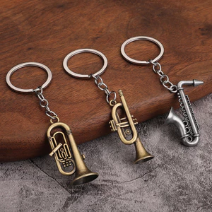 Nhạc cụ mini đồ chơi thu nhỏ saxophone kim loại mini vòng chìa khóa mặt dây chuyền âm nhạc