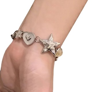 Vòng tay trái tim ngôi sao dây xích thời trang, đính hạt sang trọng, tạo vẻ quyến rũ và độc đáo cho bạn.