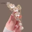 Móng vuốt tua rua hoa nhài thanh lịch Luimo Pearl trên mặt sau SBS