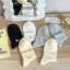 Vớ tất cổ trung gân trơn thêu hình chú cún màu pastel