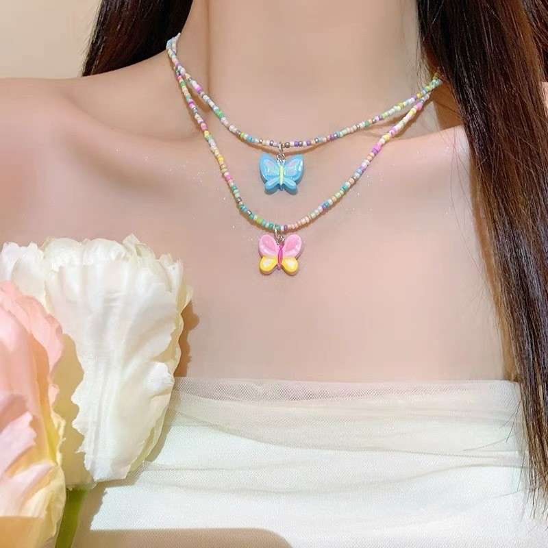 Vòng cổ mặt dây chuyền hình bướm màu kẹo dành cho nữ - Vòng cổ đính cườm Dopamine - Thời trang Hàn Quốc Ngọt ngào thanh lịch - Vòng cổ chuỗi xương đòn đi biển cho bé gái - Phụ kiện trang sức phổ biến