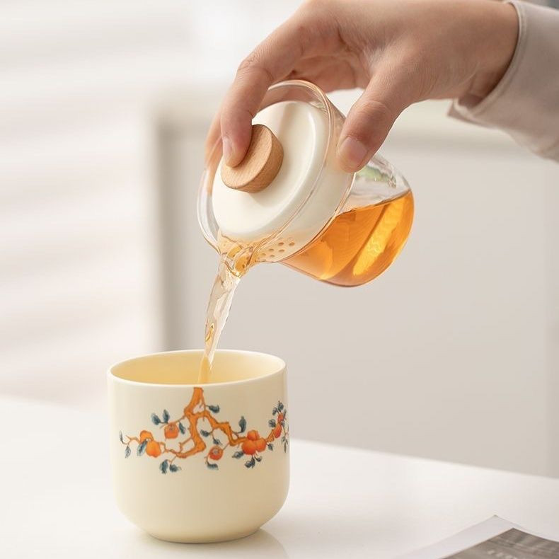 Bộ trà gốm ngoài trời Persimmon Ruyi Bộ trà du lịch sứ trắng di động Một nồi Một cốc có túi