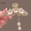 Móng vuốt tua rua hoa nhài thanh lịch Luimo Pearl trên mặt sau SBS