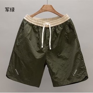 Quần short phối màu mùa hè Quần short nam mới hợp thời trang Thể thao dáng rộng thông thường