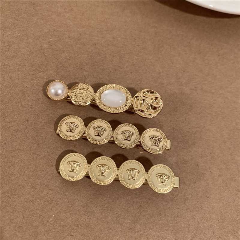 Kẹp tóc ngọc trai cổ điển Opal