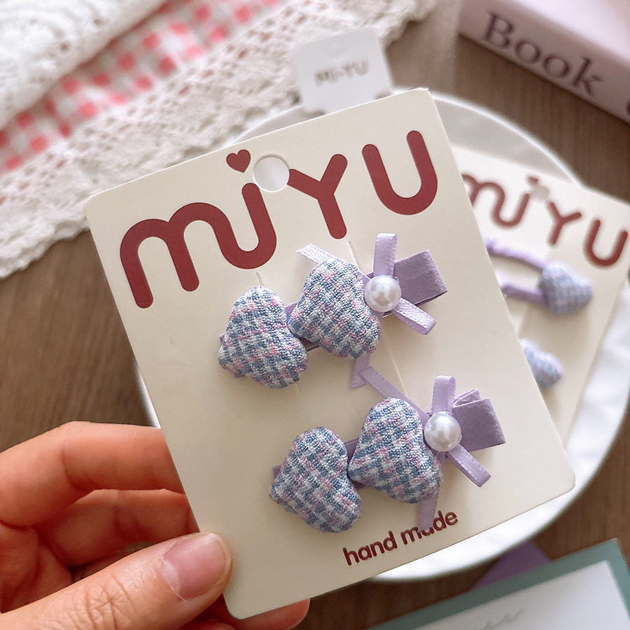 Bộ kẹp tóc hình trái tim màu tím ngọt ngào dành cho bé gái
