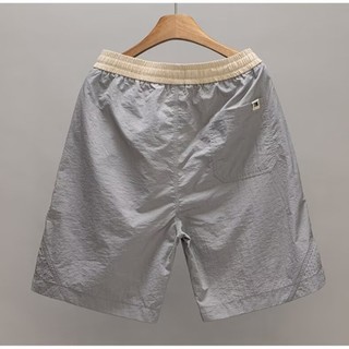 Quần short phối màu mùa hè Quần short nam mới hợp thời trang Thể thao dáng rộng thông thường
