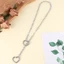 Unstop * Vòng cổ mặt dây chuyền trái tim rỗng Dây chuyền trượt kim loại Áo len thời trang Dây chuyền trang sức