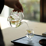 Ấm trà thủy tinh Osmanthus dày chịu nhiệt độ cao Nồi tay cầm dung tích nhỏ có thể mở lửa Bộ trà trà luộc gia đình [A204-04] — ảnh 2