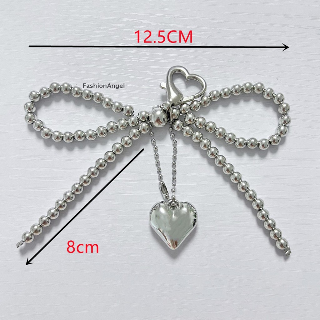 FashionAngel Ngọt Ngào Nơ Trái Tim Móc Khóa Mặt Dây Chuyền Đáng Yêu Đính Hạt Trang Trí Móc Khóa Quyến Rũ Điện Thoại Dây Quyến Rũ Túi Mặt Dây Chuyền
Mặt dây chuyền móc khóa trái tim nơ ngọt ngào đáng yêu