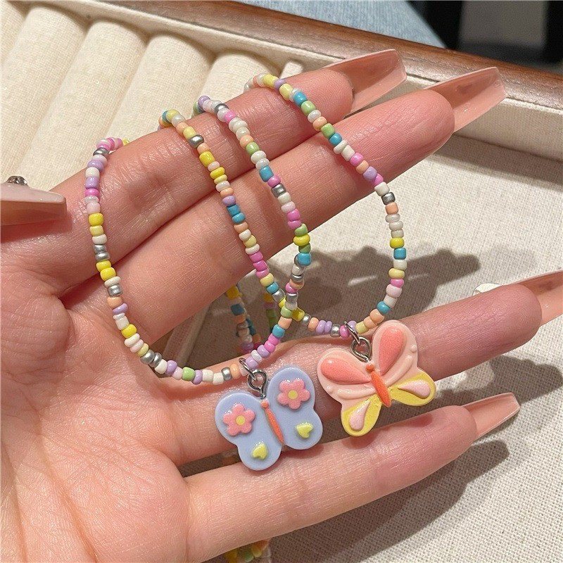 Vòng cổ mặt dây chuyền hình bướm màu kẹo dành cho nữ - Vòng cổ đính cườm Dopamine - Thời trang Hàn Quốc Ngọt ngào thanh lịch - Vòng cổ chuỗi xương đòn đi biển cho bé gái - Phụ kiện trang sức phổ biến