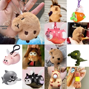 Kéo dây để bay cánh đồ chơi cá nóc bay mặt dây chuyền túi dễ thương móc khóa xe Capibala