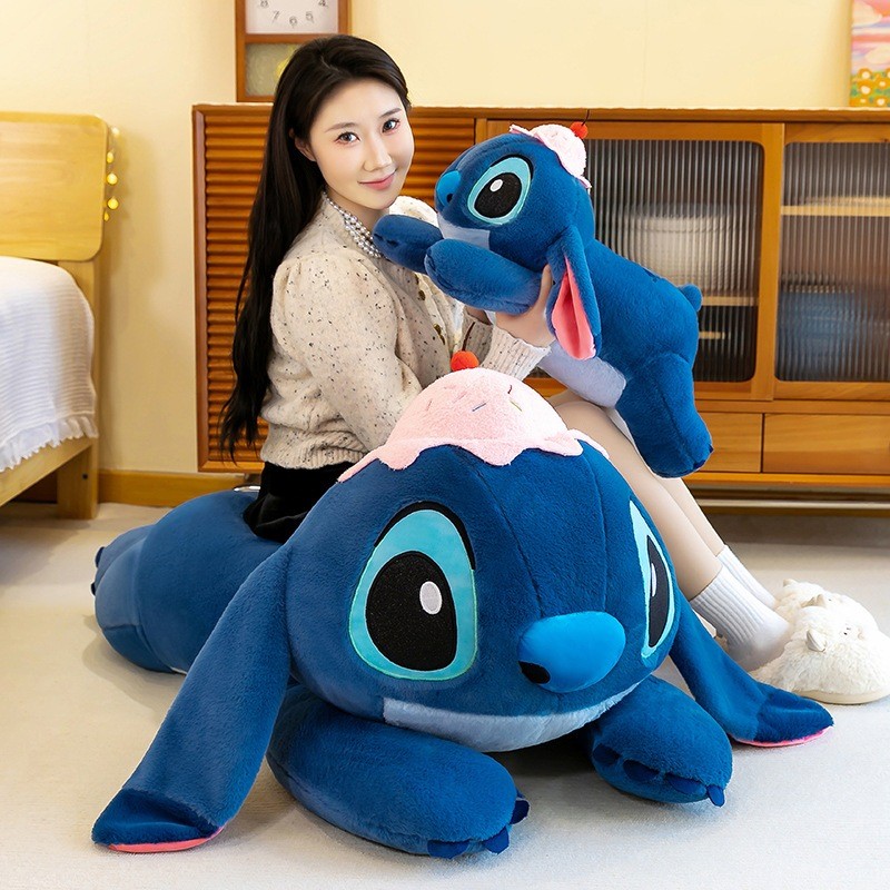 Gấu Bông Ôm Ngủ Stitch Dáng Nằm Dùng Để Ôm Gác Chân Dựa Lưng Gấu Nằm Stick Đội Mũ Bánh Chất Liệu An Toàn Thân Thiện