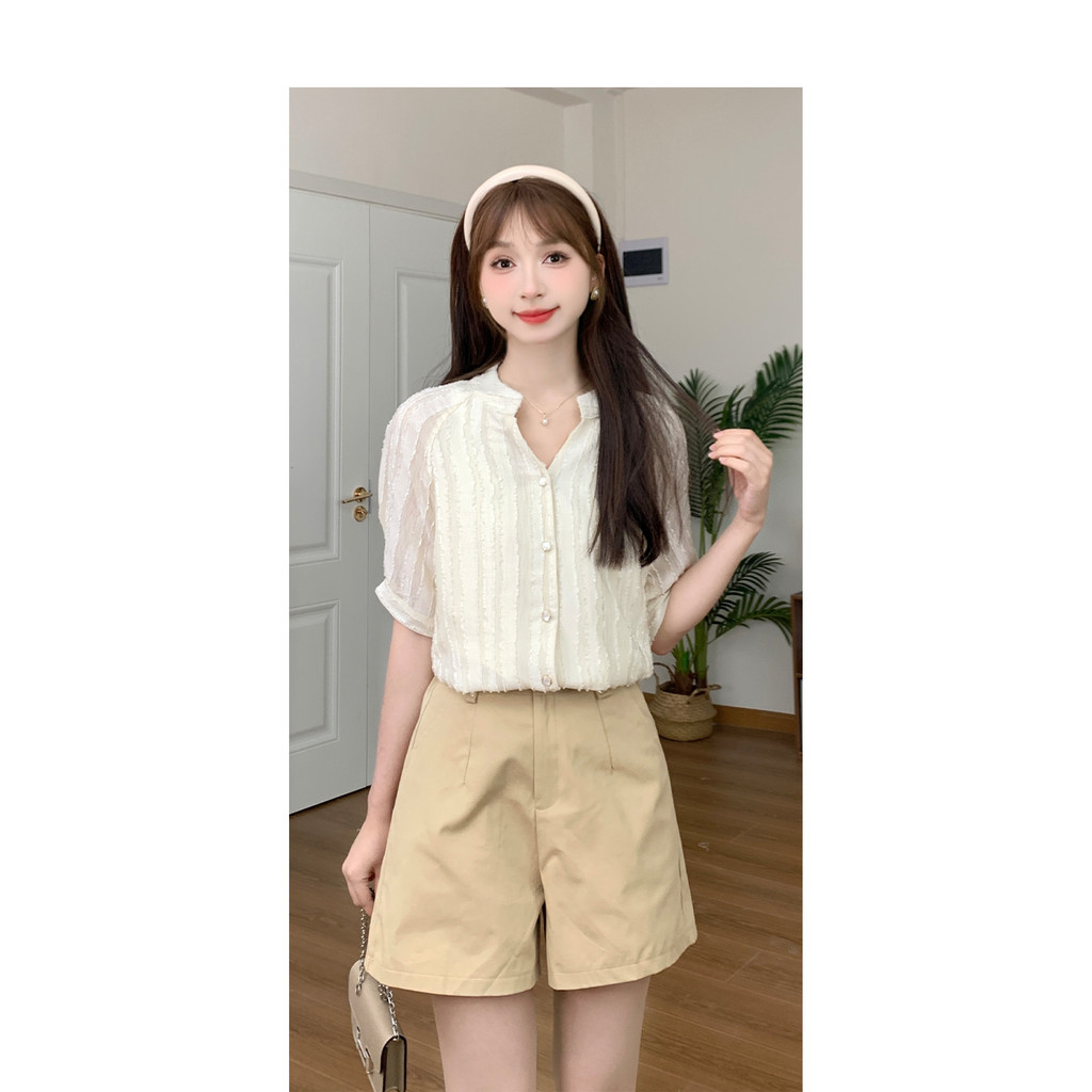 Mutu Áo sơ mi nữ phong cách cung điện thanh lịch màu trơn cổ chữ V thiết kế phương tây mới mùa hè 2026