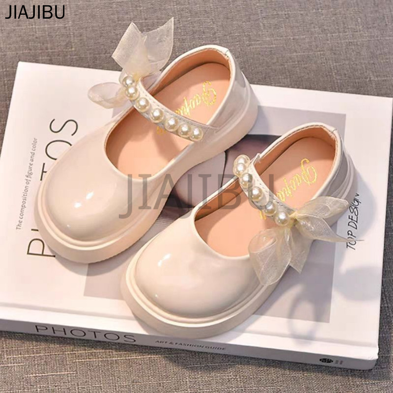 Giày Trẻ Em Thời Trang Giày Công Chúa Nơ Màu Be Dễ Thương Cho Bé Gái Giày Đi Học Màu Đen Korean Fashion Platform Mary Jane Shoes Giày Da Nhỏ Lolita Ngọc Trai Nhật Bản Giản Dị British Style Casual Soft Sole Cosplay Doll Shoes Giày Khiêu Vũ Giày Búp Bê