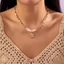 Vòng cổ ngọc trai kỳ nghỉ exhila với mặt dây chuyền và hạt sao biển Bohemian