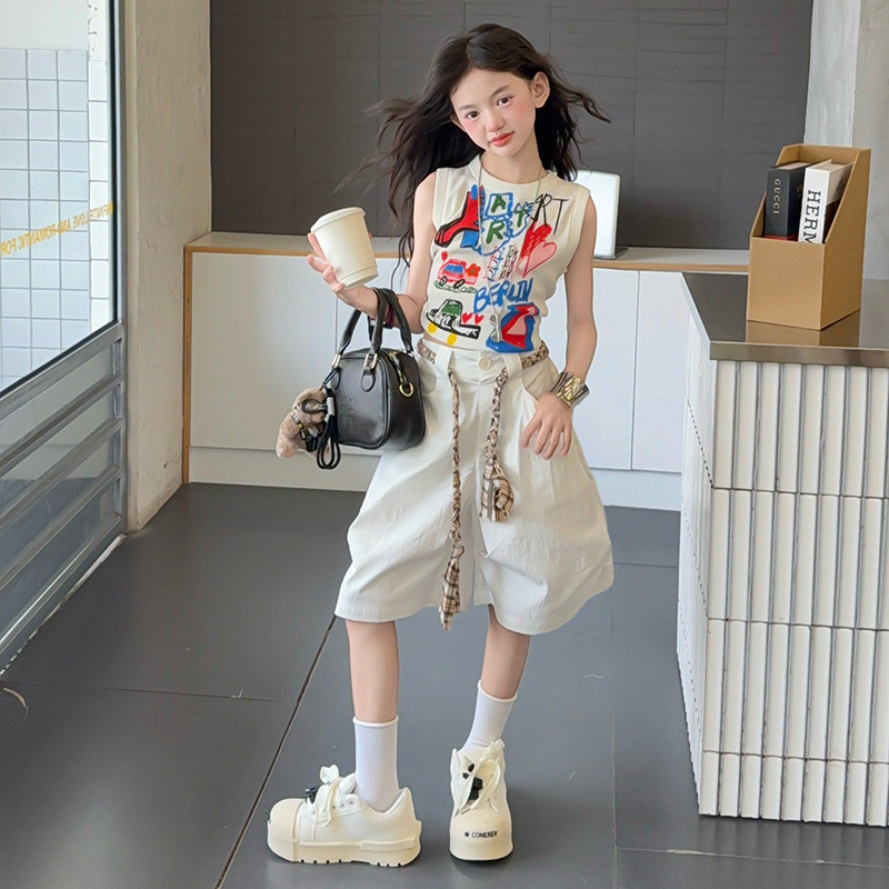 Bộ đồ thời trang bé gái 2025 Phong cách mới Phiên bản Hàn Quốc Áo Vest in hình trẻ em + Quần rộng giữa Bộ đồ hai mảnh