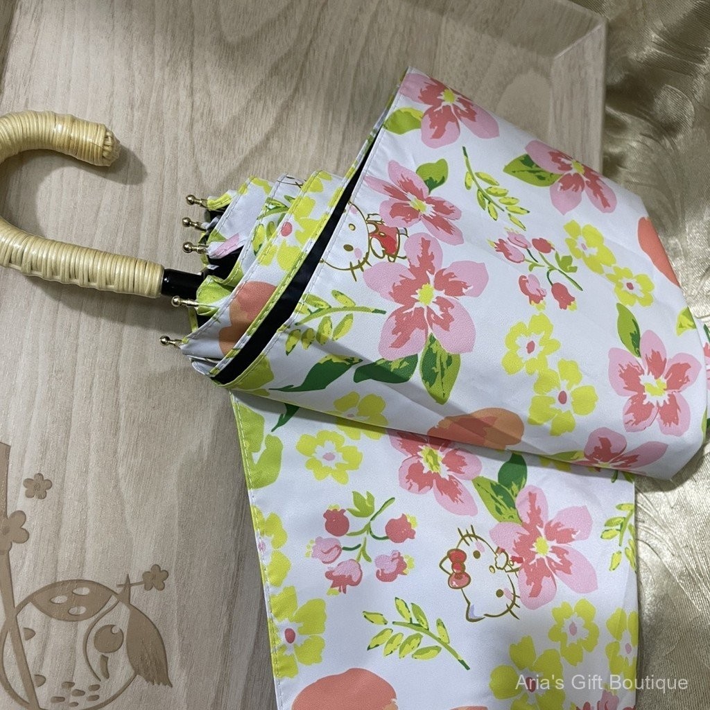 Ô che nắng Hello Kitty chính hãng, chất liệu vinyl siêu nhẹ, chắn nắng hiệu quả.