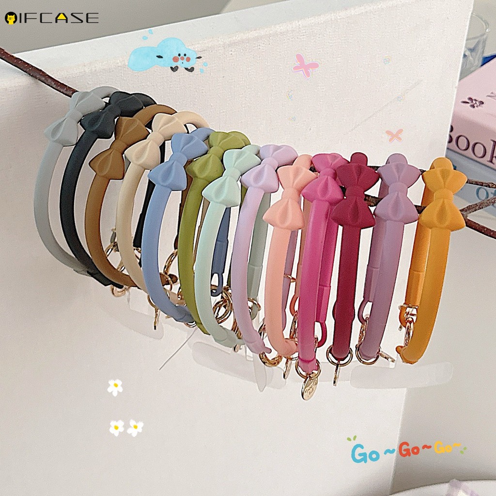 Dây đeo điện thoại di động 3D nơ thắt dễ thương, giá đỡ thẻ ID, chất liệu silicon, kiểu dáng mùa hè