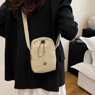 Túi đeo chéo NOOKSTORY, Túi đeo vai đơn phong cách thể thao bằng vải Nylon, Túi nhỏ màu trơn dây rút thời trang Unisex