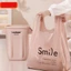 Set 50 túi rác polyester màu hồng xanh smile dày đẹp 3 size
