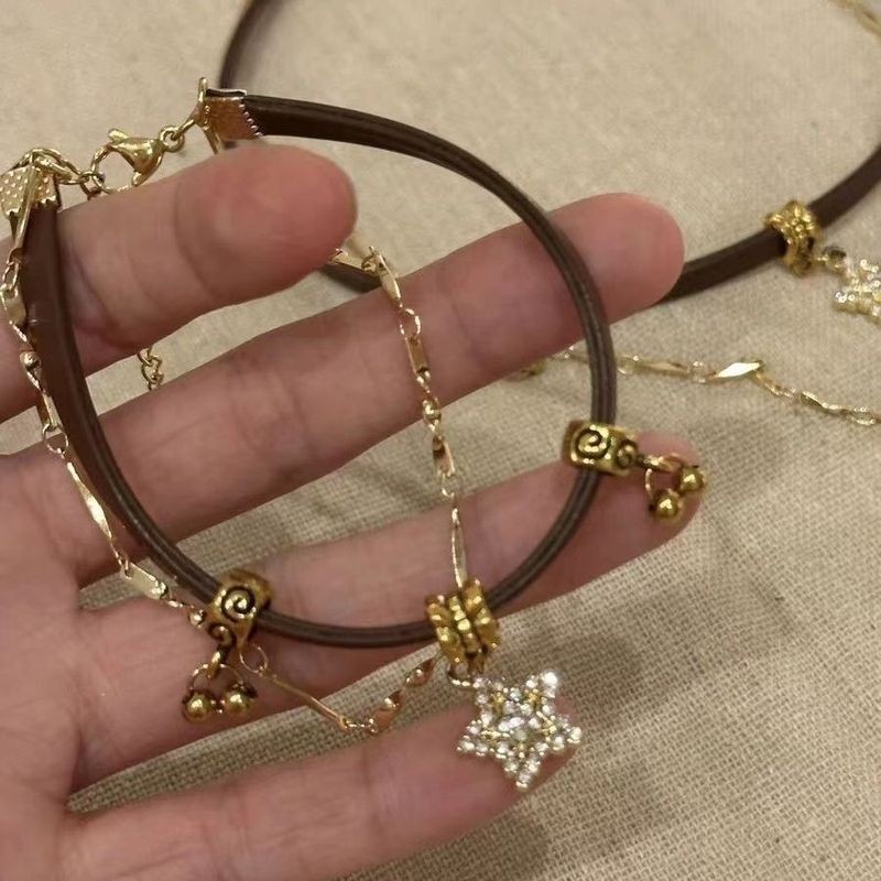Vòng tay dây da xếp chồng hai lớp Merad